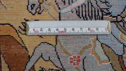 Backside of handmade 1980s Ghom rug showing knot structure and weave density