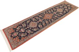 Corner detail of 1990s Ghom rug showing border pattern and Wool pile