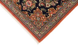 Backside of handmade 1990s Ghom rug showing knot structure and weave density