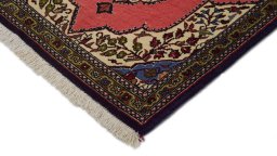Surface texture of 1990s Ghom rug with natural Wool and intricate pattern
