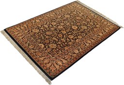 Corner detail of New Ghom rug showing border pattern and Silk pile