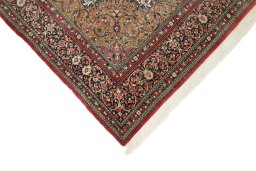 Backside of handmade 1980s Ghom rug showing knot structure and weave density