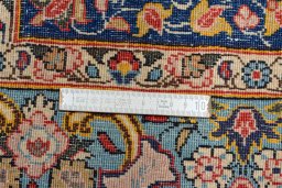 Central medallion detail of 1950s Ghom rug from Iran / Persia