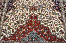 Surface texture of 2000s Ghom rug with natural Cork and intricate pattern