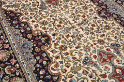 Backside of handmade 2000s Ghom rug showing knot structure and weave density