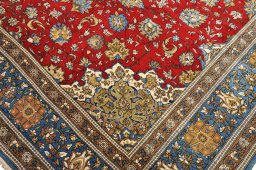 Close-up detail of 1970s Ghom rug from Iran / Persia showing Wool weave