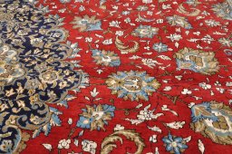 Central medallion detail of 1970s Ghom rug from Iran / Persia