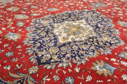 Close-up detail of 1970s Ghom rug from Iran / Persia showing Wool weave