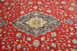 Close-up detail of 1970s Ghom rug from Iran / Persia showing Wool weave