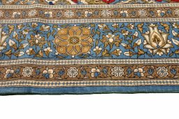 Corner detail of 1970s Ghom rug showing border pattern and Wool pile