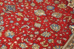 Close-up detail of 1970s Ghom rug from Iran / Persia showing Wool weave
