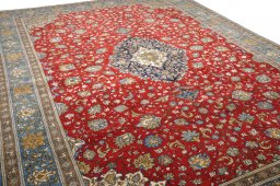Central medallion detail of 1970s Ghom rug from Iran / Persia