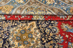 Close-up detail of 1970s Ghom rug from Iran / Persia showing Wool weave