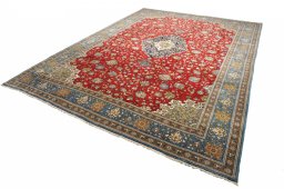 Surface texture of 1970s Ghom rug with natural Wool and intricate pattern