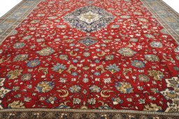 Backside of handmade 1970s Ghom rug showing knot structure and weave density