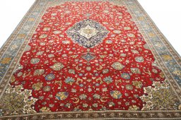 Central medallion detail of 1970s Ghom rug from Iran / Persia