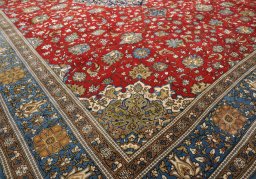 Close-up detail of 1970s Ghom rug from Iran / Persia showing Wool weave