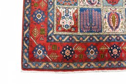 Close-up detail of 1950s Ghom rug from Iran / Persia showing Wool weave