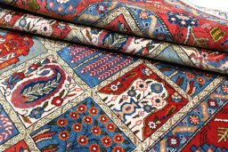 Full view of 1950s Ghom rug from Iran / Persia, 197 × 140 cm in Multi Color tones