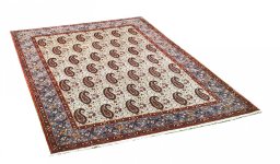 Corner detail of 1950s Ghom rug showing border pattern and Wool pile