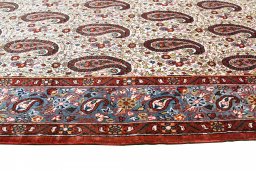 Surface texture of 1950s Ghom rug with natural Wool and intricate pattern