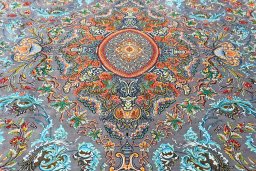 Surface texture of New Ghom rug with natural Silk and intricate pattern