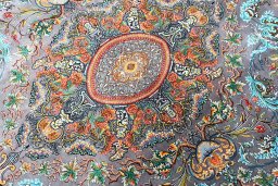 Surface texture of New Ghom rug with natural Silk and intricate pattern