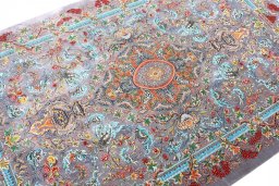 Backside of handmade New Ghom rug showing knot structure and weave density