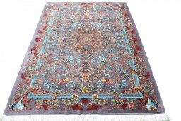 Surface texture of New Ghom rug with natural Silk and intricate pattern