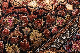 Close-up detail of New Ghom rug from Iran / Persia showing Silk weave