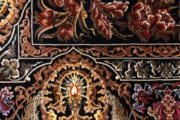 Surface texture of New Ghom rug with natural Silk and intricate pattern