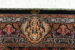 Surface texture of New Ghom rug with natural Silk and intricate pattern
