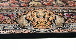 Backside of handmade New Ghom rug showing knot structure and weave density