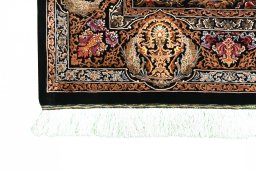 Central medallion detail of New Ghom rug from Iran / Persia