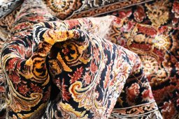 Close-up detail of New Ghom rug from Iran / Persia showing Silk weave