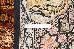 Corner detail of New Ghom rug showing border pattern and Silk pile