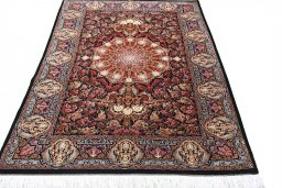 Surface texture of New Ghom rug with natural Silk and intricate pattern