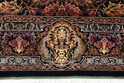 Backside of handmade New Ghom rug showing knot structure and weave density