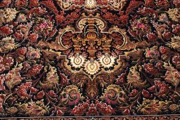 Central medallion detail of New Ghom rug from Iran / Persia