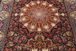 Close-up detail of New Ghom rug from Iran / Persia showing Silk weave