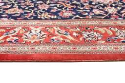Corner detail of 2000s Ghom rug showing border pattern and Cork pile
