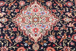 Central medallion detail of 2000s Ghom rug from Iran / Persia