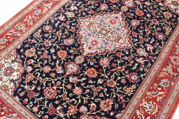 Close-up detail of 2000s Ghom rug from Iran / Persia showing Cork weave