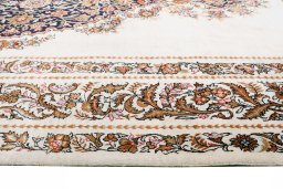 Corner detail of New Ghom rug showing border pattern and Silk pile