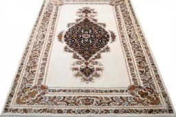 Surface texture of New Ghom rug with natural Silk and intricate pattern