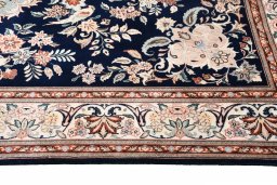Corner detail of New Ghom rug showing border pattern and Wool pile