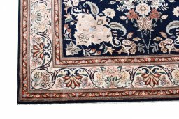 Close-up detail of New Ghom rug from Iran / Persia showing Wool weave