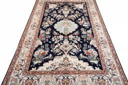 Surface texture of New Ghom rug with natural Wool and intricate pattern