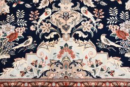 Backside of handmade New Ghom rug showing knot structure and weave density