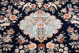 Central medallion detail of New Ghom rug from Iran / Persia